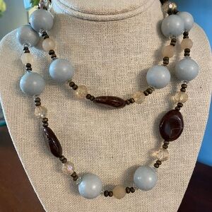 Elegant Beaded Necklace with Blue and Brown Accents